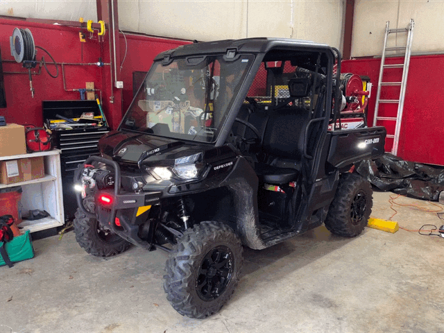 Riverview Fire Department ATV utility vehicle in the station bay with running lights